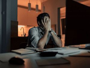 Stressed overworked man feeling burnout